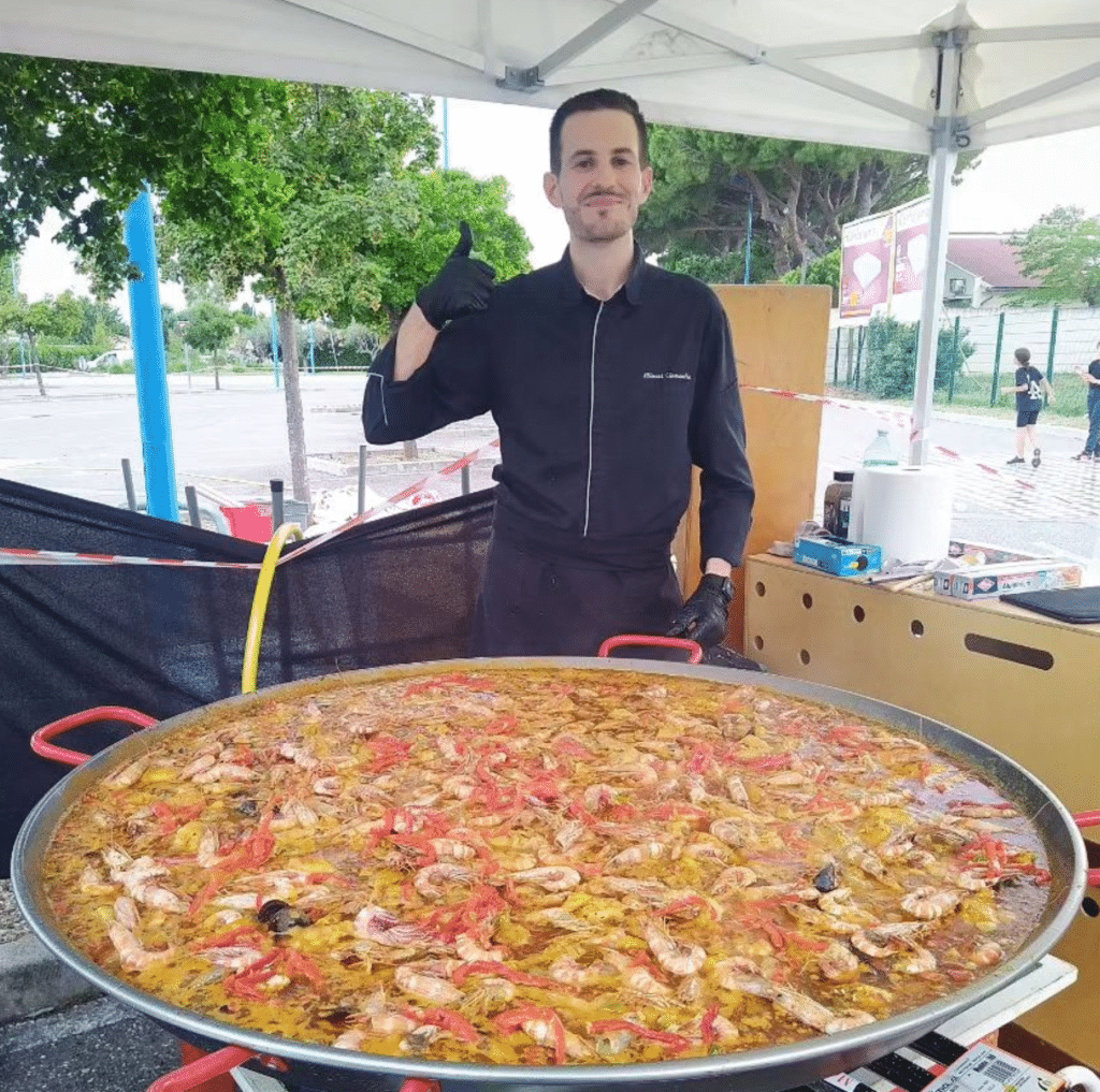 chef clément with a giant paella