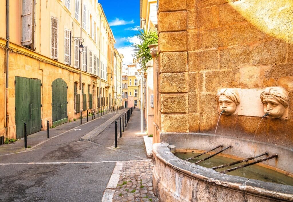 Historic fountains and elegant architecture in Aix-en-Provence, known as the city of water and art in Provence