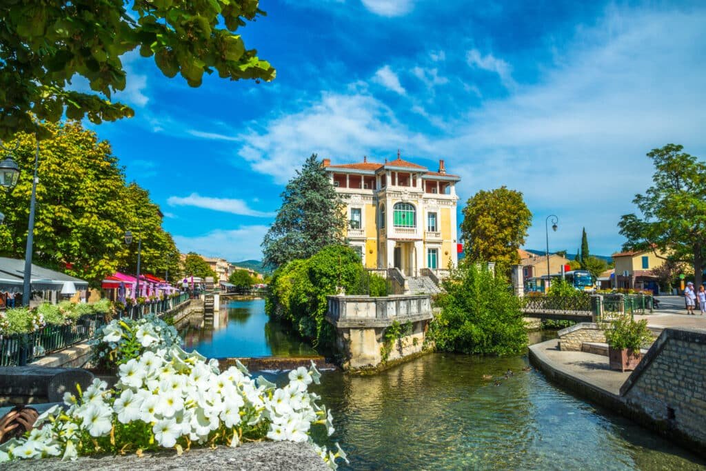 Village of L’Isle-sur-la-Sorgue with canals and waterways