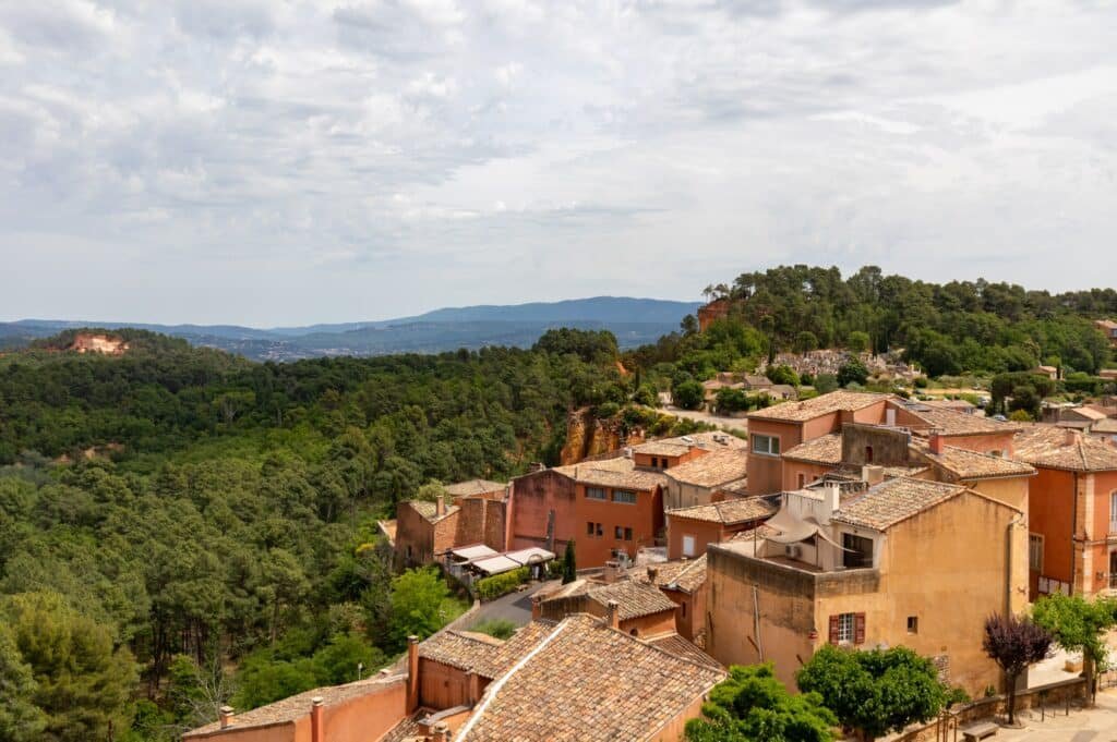 Roussillon village in Provence with ochre cliffs and traditional houses